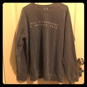 “Your brokenness is welcome here” sweatshirt